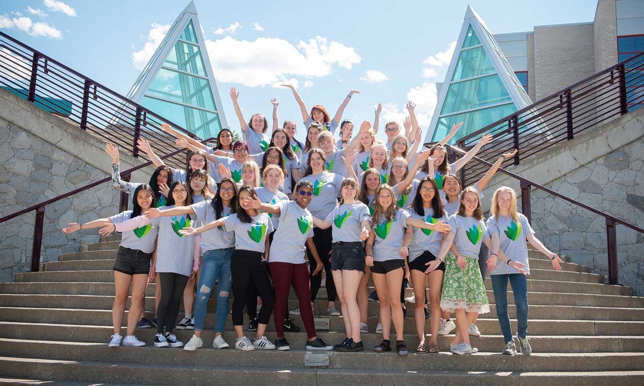 minerva bc large group of youth women happy at learning to lead program