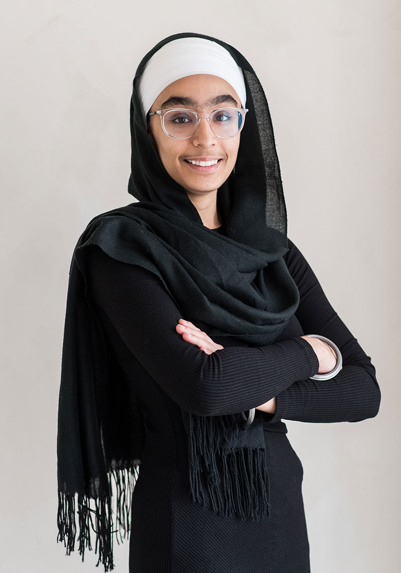 minerva bc happy woman youth dressed up with glasses